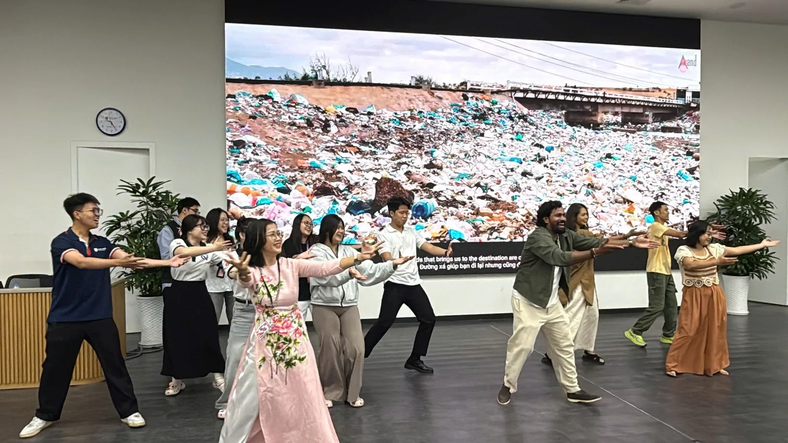 Master Oneness and students practicing movement together during the session